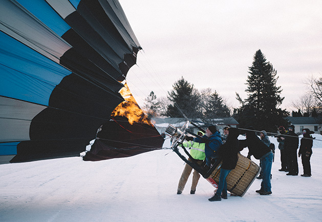 Participants launch a balloon at the Hudson Hot Air Affair.