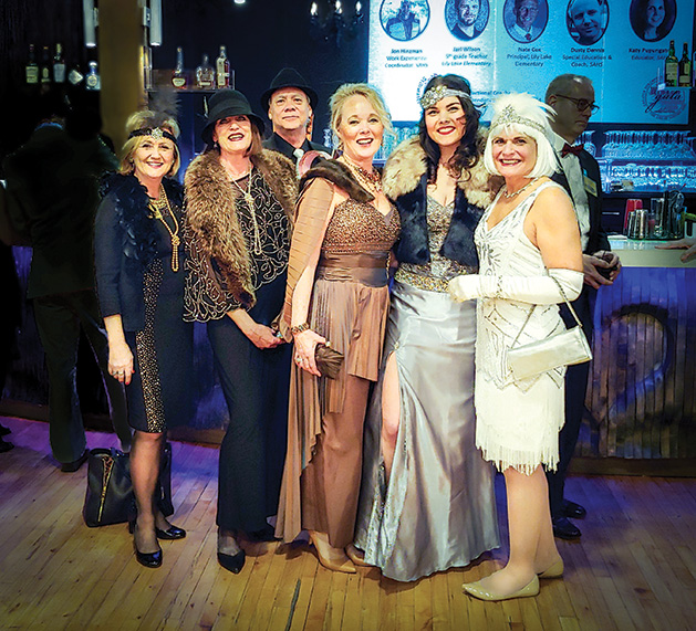 Attendees at the Stillwater Chamber Gala pose for a photo.