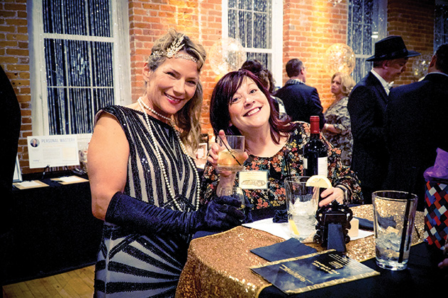 Attendees at the Stillwater Chamber Gala pose for a photo.