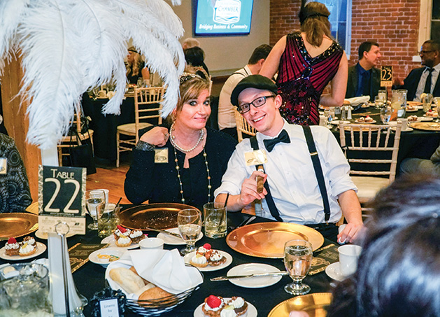 Attendees at the Stillwater Chamber Gala pose for a photo.