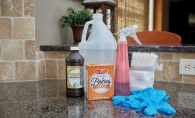 Fall cleaning products sit on a kitchen counter.