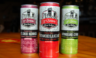 Three cans of Lift Bridge Brewing Co.'s hard seltzers - St. Croix Berries, Northwoods Juicebox and Voyageurs Citrus