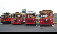 Four trolleys from Stillwater Trolley await riders before a tour of the city.