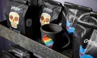 Bags of Colectivo Coffee sit next to a Wisconsin mug at The Purple Tree gift shop.
