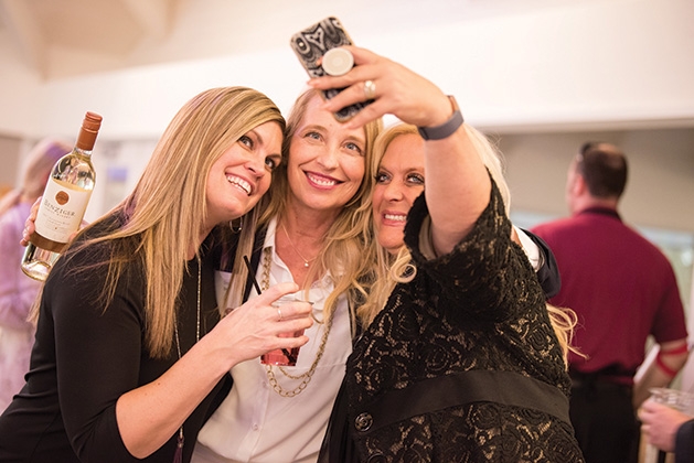Three women take a selfie at United by the Vine 2019
