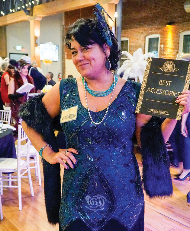 An attendee at the Stillwater Chamber Gala poses for a photo.