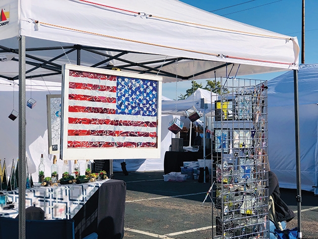 A booth at the Rivertown Fall Art Festival 2019