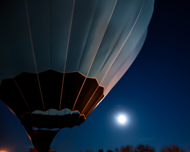 A hot air balloon in the sky at Hudson Hot Air Affair.