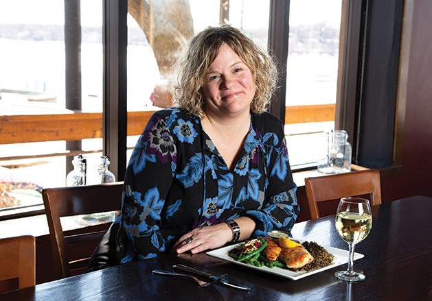Katy Rugg Pier 500 assistant general manager Katy Rugg enjoys a meal and a glass of white wine.
