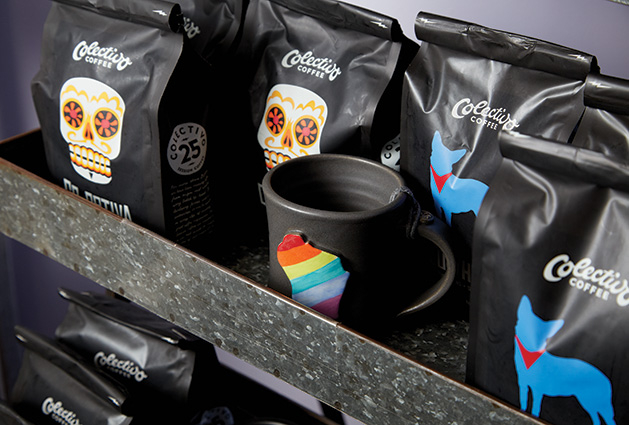 Colectivo Coffee Bags of Colectivo Coffee sit next to a Wisconsin mug at The Purple Tree gift shop.