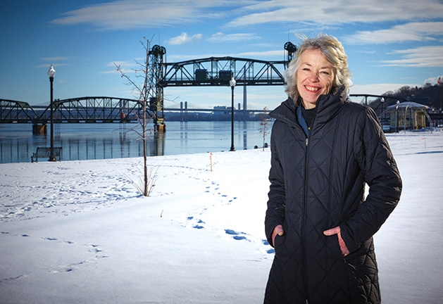Charlene Roise Charlene Roise, author of The Saga of the Stillwater Lift Bridge, stands with the bridge in the background.