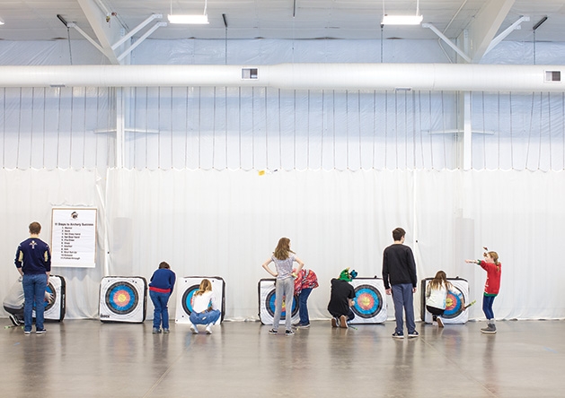 The St. Croix Preparatory Academy archery team practices in their indoor facility.