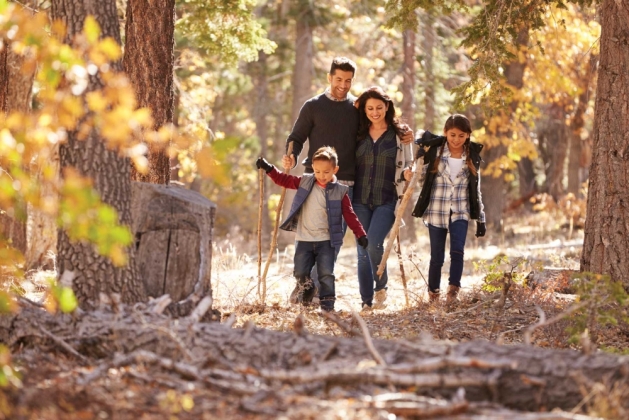 Family out on a fall walk.