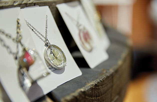 Items from Pressed Flower Shop on display at Smith + Trade Mercantile.