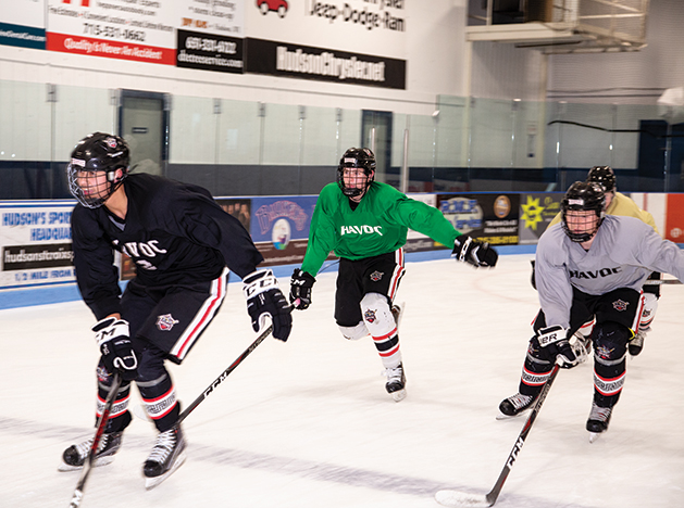 Hudson Havoc players skate down the ice.