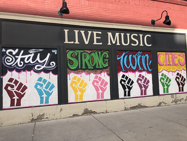 A mural that reads "Stay Strong Twin Cities.